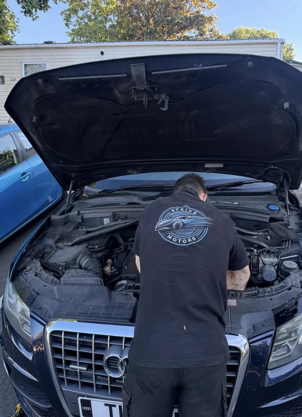 Strive Motors technician carrying out mobile vehicle repairs